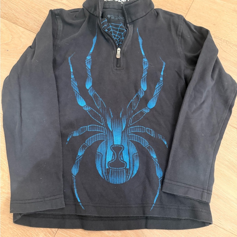 Spyder Black 1/4 zip with Blue Web Design